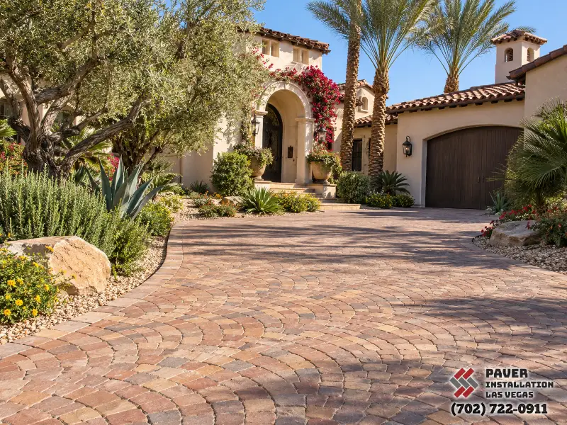 Driveway Paver Installation in Las Vegas, NV: Paver driveway approaching an arched home entrance